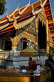 Chiang Mai - The Wat Phra Singh temple. The large Viharn Luang (main prayer hall) with an intricately carved front.  